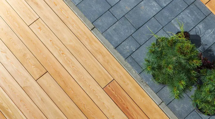 wood deck and concrete bricks pavement in a garden 2021 08 29 16 57 17 utc
