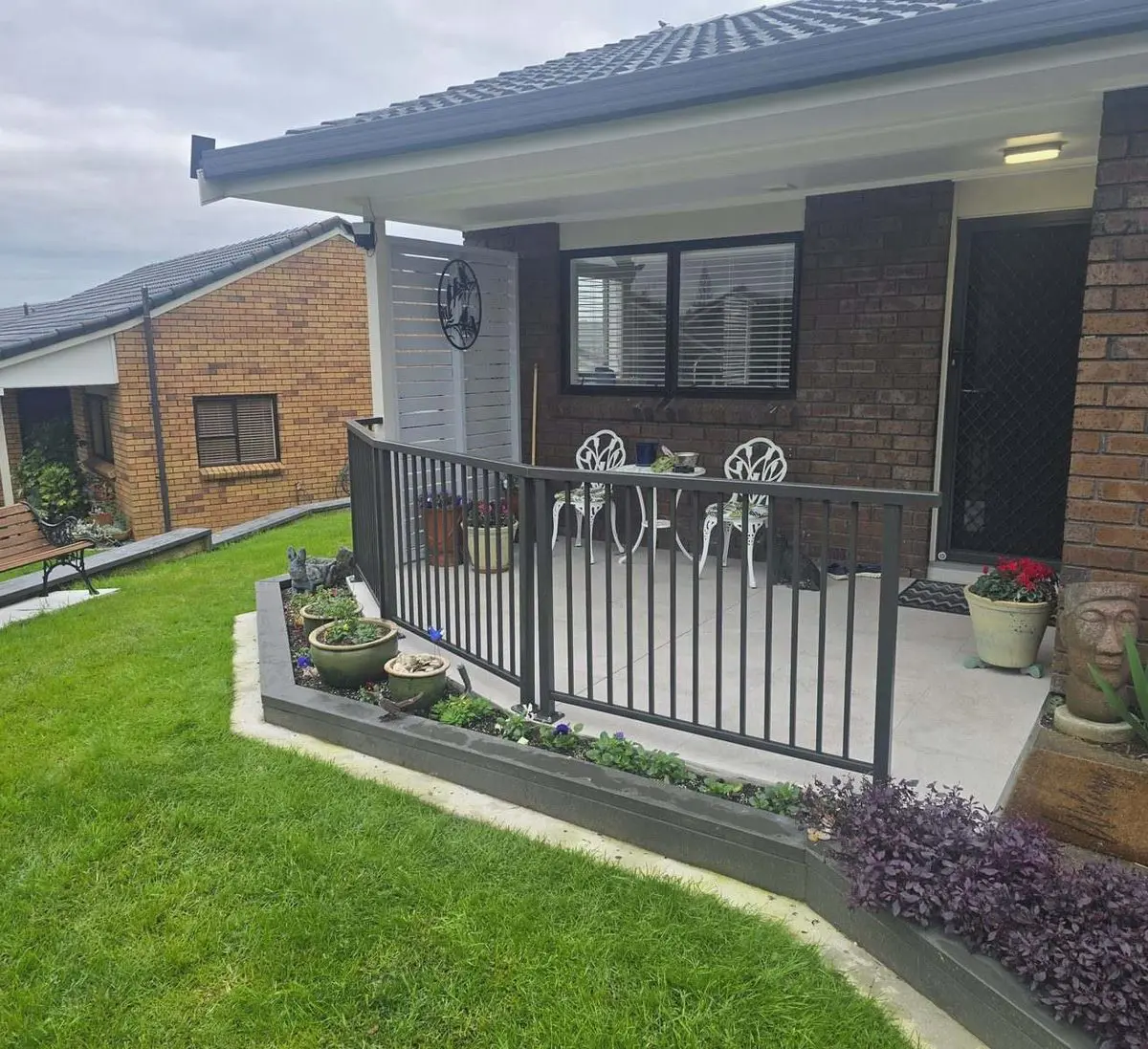 Balustrades 4 Black aluminium balustrade on the front porch of an Auckland home