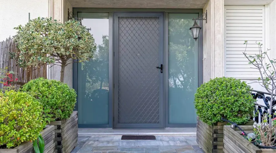 Amplimesh security screen door fitted to the front entry of an Auckland home